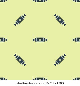 Blue Candy icon isolated seamless pattern on yellow background. Merry Christmas and Happy New Year.  Vector Illustration