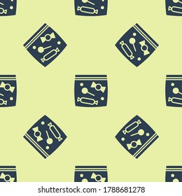 Blue Candy packaging for sweets icon isolated seamless pattern on yellow background. Bag with candy.  Vector
