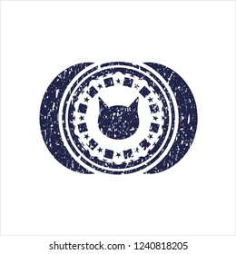 Blue cat face icon inside distress rubber grunge texture stamp