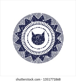 Blue cat face icon inside distress rubber seal