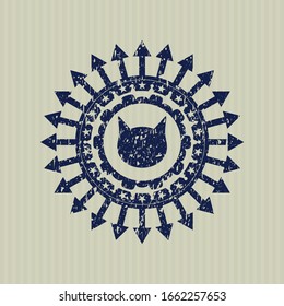 Icône de visage de chat bleu à l'intérieur du timbre de style grunge de détresse