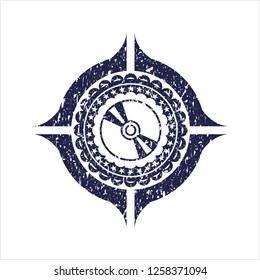 Blue CD or DVD disc icon inside distress grunge seal