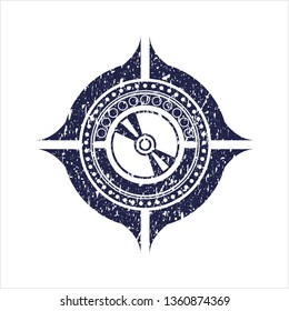 Blue CD or DVD disc icon inside rubber texture