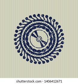 Blue CD or DVD disc icon inside distressed rubber texture