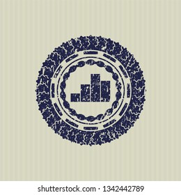 Blue chart icon inside distress rubber grunge texture stamp
