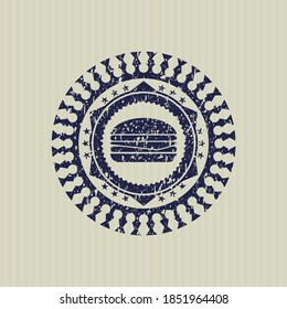 Icono azul cheeseburger en el interior del estampado de goma en peligro. 