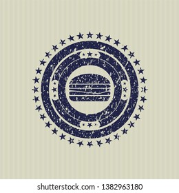 Blue cheeseburger icon inside distressed rubber texture