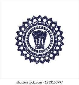 Blue chef hat icon inside rubber grunge seal