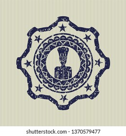 Blue chef icon inside distress rubber seal