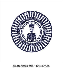 Blue chef icon inside distressed rubber texture