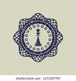 Blue chess king icon inside distress grunge seal