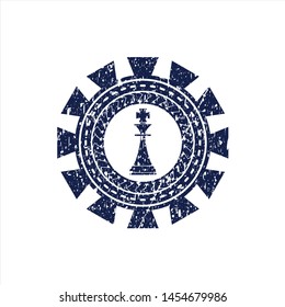 Blue chess king icon inside grunge stamp