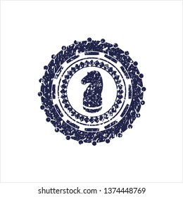 Blue chess knight icon inside distress rubber seal