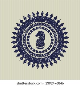 Blue chess knight icon inside rubber stamp
