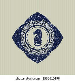 Blue chess knight icon inside distress rubber grunge stamp
