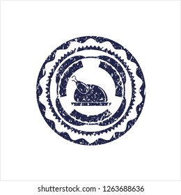 Blue chicken dish icon inside distressed rubber seal