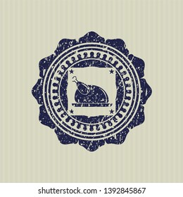 Blue chicken dish icon inside distressed rubber seal with grunge texture