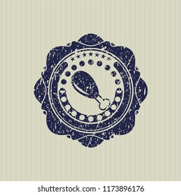 Blue chicken leg icon inside rubber seal with grunge texture