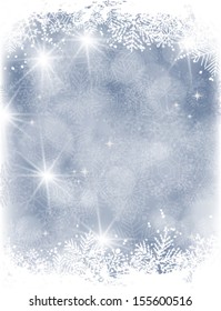 Blue Christmas background with falling snow and lights and grunge  frame of snowflakes