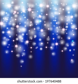 Blue Christmas background with sparkles.