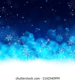 blue Christmas background using gradient lay down from white to dark blue look like snows are dropping to white smooth fog and flares on top presented in clear night of winter.