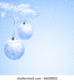Blue christmas balls hanging from fir-tree