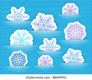 Blue christmas flakes in a pockets. Vector collection