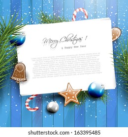 Blue Christmas greeting card with empty paper with copyspace