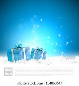 Blue Christmas greeting card with gift boxes in the snow