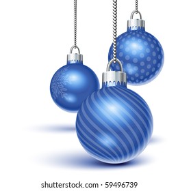 Blue christmas ornaments hanging over white