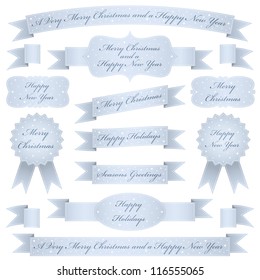 blue christmas ribbons, emblems and labels with seasonal messages, isolated on white