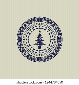 Blue christmas tree icon inside distress with rubber seal texture