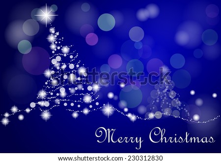 blue christmas tree with stars and snow