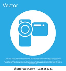 Blue Cinema camera icon isolated on blue background. Video camera. Movie sign. Film projector. White circle button. Flat design. Vector Illustration