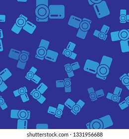 Blue Cinema camera icon isolated seamless pattern on blue background. Video camera. Movie sign. Film projector. Vector Illustration
