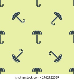 Blue Classic elegant opened umbrella icon isolated seamless pattern on yellow background. Rain protection symbol.  Vector