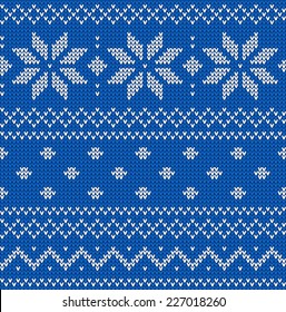 Blue classic knitted pattern with stars. Christmas background. Vector illustration.