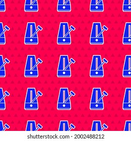 Blue Classic Metronome with pendulum in motion icon isolated seamless pattern on red background. Equipment of music and beat mechanism.  Vector