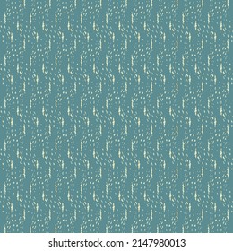 Blue cloth with a pattern made of short linear markings and various tiny flecks. Abstract fabric texture.