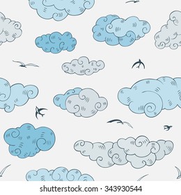 Blue Clouds, seamless pattern. Hand drawn vector illustration. 
