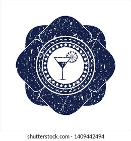 Blue cocktail glass icon inside distress rubber stamp with grunge texture