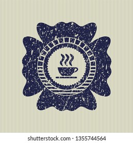 Blue coffee cup icon inside rubber stamp with grunge texture