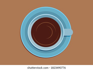 Blue coffee cup on brown table.