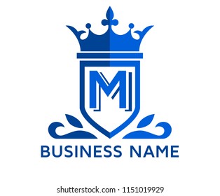 blue color beautiful simple luxury classic vintage swirl or floral shield border logo design template with initial name of business company on it type letter m