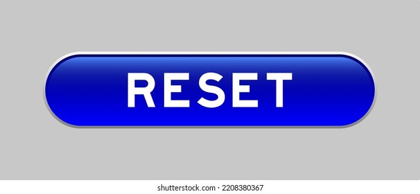 Blue Color Capsule Shape Button With Word Reset On Gray Background