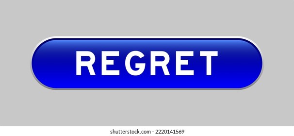 Blue color capsule shape button with word regret on gray background