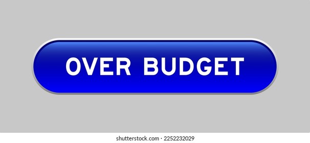 Blue color capsule shape button with word over budget on gray background
