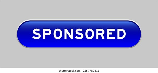 Botón de forma de cápsula de color azul con la palabra patrocinada sobre fondo gris