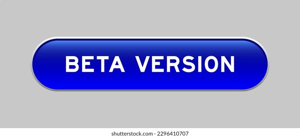 Blue color capsule shape button with word beta version on gray background