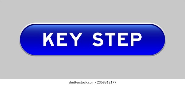 Blue color capsule shape button with word key step on gray background